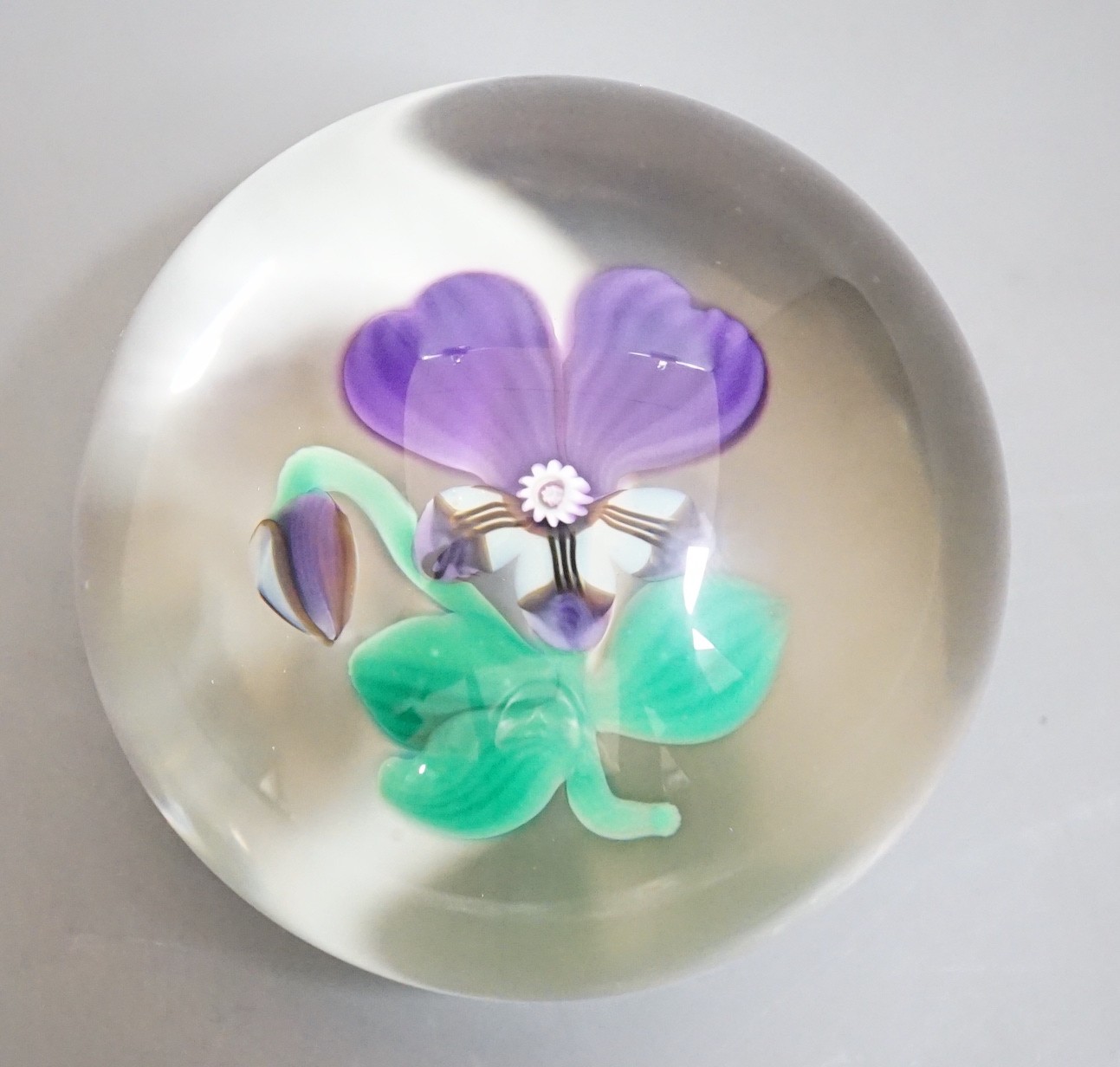 An SGS purple pansy small paperweight, no.108/500, dated 1999